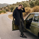 Merino Wool Hooded Coat with Longline Silhouette and Quilted Down Interior