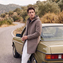 Merino Wool Hooded Coat with Longline Silhouette and Quilted Down Interior